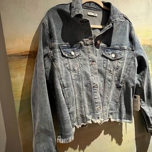 DEX jean jacket. Distressed edge. Stretchy denim.